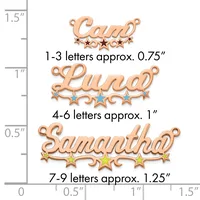 Three copper pendants with names in cursive script decorated with stars, shown next to a ruler indicating sizes from 0.75 to 1.25 inches.