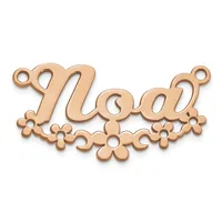 Rose gold-toned metal pendant with ornate scrolling script design and decorative flowers along the bottom edge, featuring small loops at the corners for attachment.