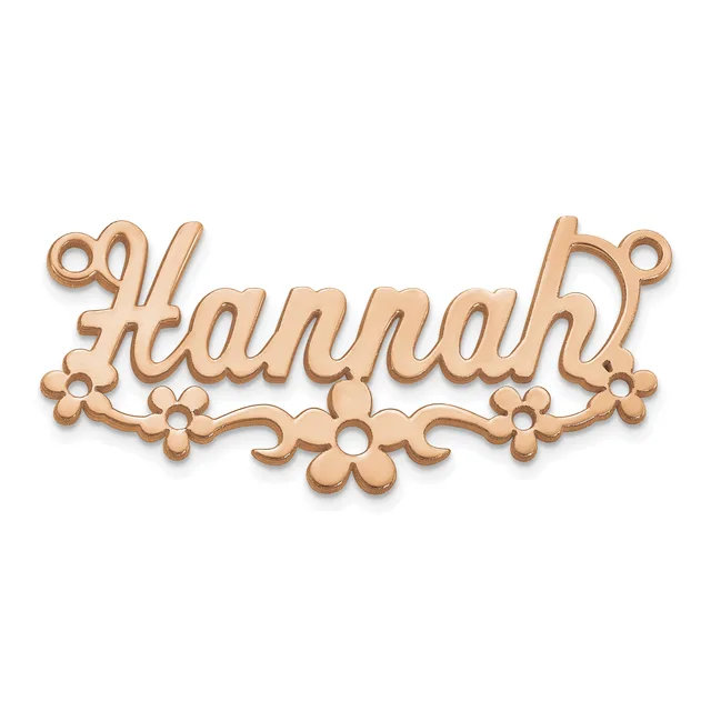 Rose gold-toned metal nameplate pendant spelling "Hannah" with decorative floral elements and small loops at the top corners for attachment.