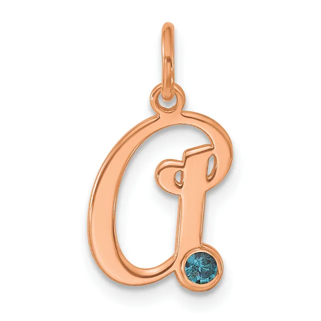 Rose gold letter Q pendant with a small blue gemstone set at the bottom and a loop at the top for hanging.