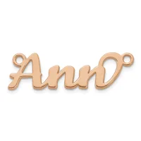 Rose gold-colored metal pendant charm shaped like the word "Ann" with small loops at each end for attachment.