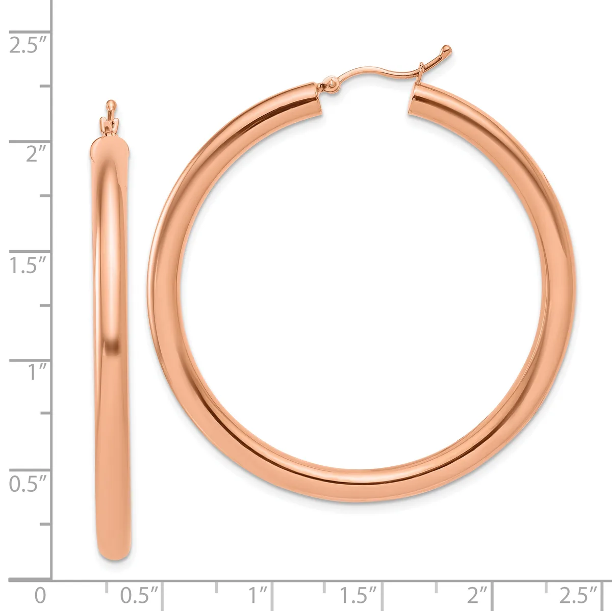 Rose gold hollow hoop earrings with a ruler showing they measure approximately 2 inches in diameter, displayed with a matching single earring for scale.