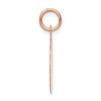 A rose gold pendant with a circular loop at the top and an elongated chain or wire stem hanging below it against a white background.