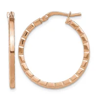 A pair of rose gold hoop earrings with a textured, segmented surface design, shown from front and side views.