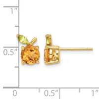 Pair of gold stud earrings featuring round citrine stones with small pear-shaped peridot accents, displayed against a measurement scale.