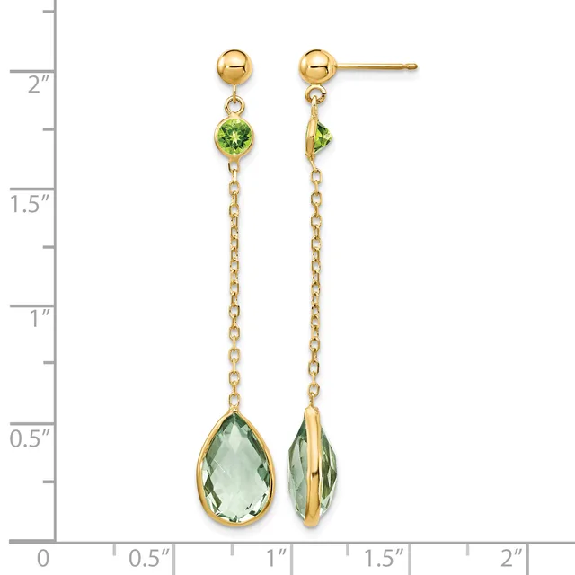Gold dangle earrings with small round peridot stones at the top, delicate chain links, and larger teardrop-shaped green amethyst stones at the bottom, shown against a ruler for scale.