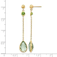 Gold dangle earrings with small round peridot stones at the top, delicate chain links, and larger teardrop-shaped green amethyst stones at the bottom, shown against a ruler for scale.