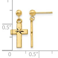 Pair of gold dangle earrings with ball posts, each featuring a cross pendant with a star pattern in the center, displayed against a measurement ruler.