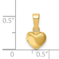 A gold heart-shaped pendant with a polished finish and rectangular bail, shown next to a measurement scale indicating it is approximately half an inch wide and tall.