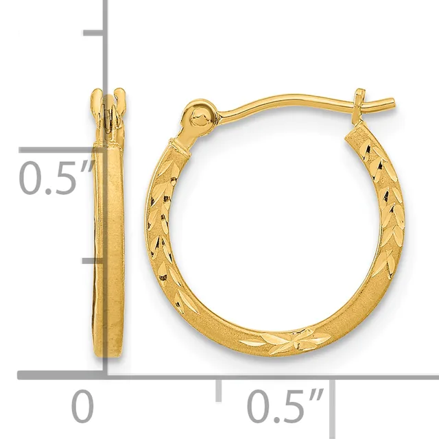 Pair of gold hoop earrings with textured diamond-cut surface and polished smooth sides, displayed with measurement scale showing approximately half-inch diameter.