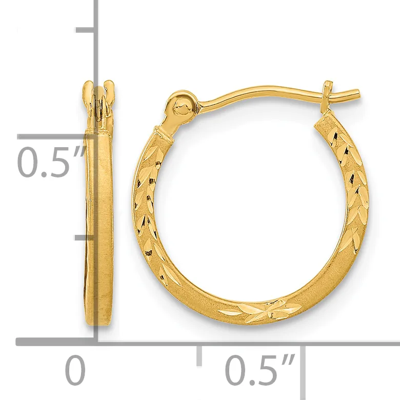 Pair of gold hoop earrings with textured diamond-cut surface and polished smooth sides, displayed with measurement scale showing approximately half-inch diameter.