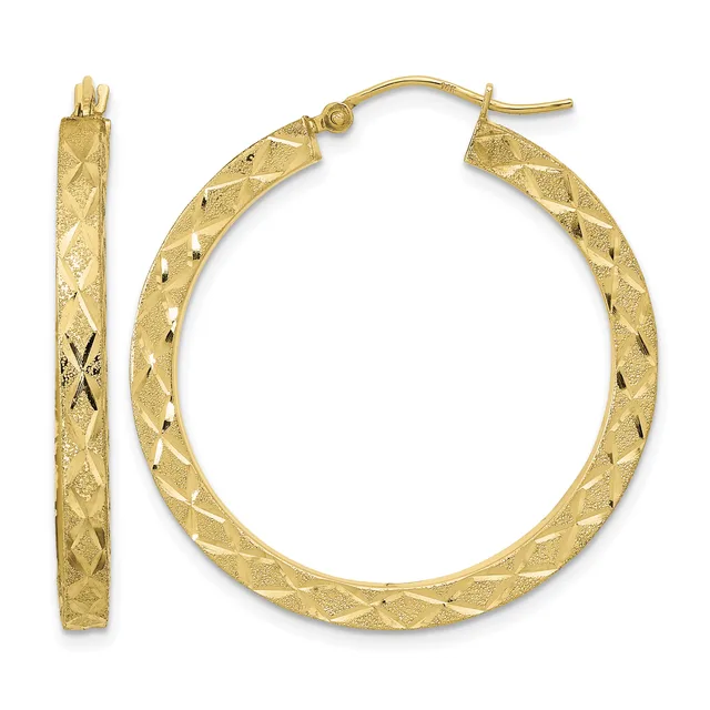 A pair of gold hoop earrings with a diamond-cut textured surface, shown from the front and side view.
