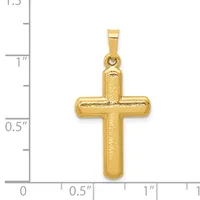 A gold cross pendant with a textured finish shown against a measurement scale indicating it is approximately one inch tall and three-quarters inch wide.