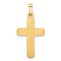 A polished gold cross pendant with rounded edges and a brushed finish, suspended from a gold bail against a white background.
