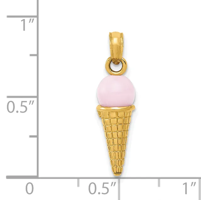 A gold ice cream cone pendant with a textured cone base and pink round stone scoop, shown against a ruler measuring approximately one inch in height.
