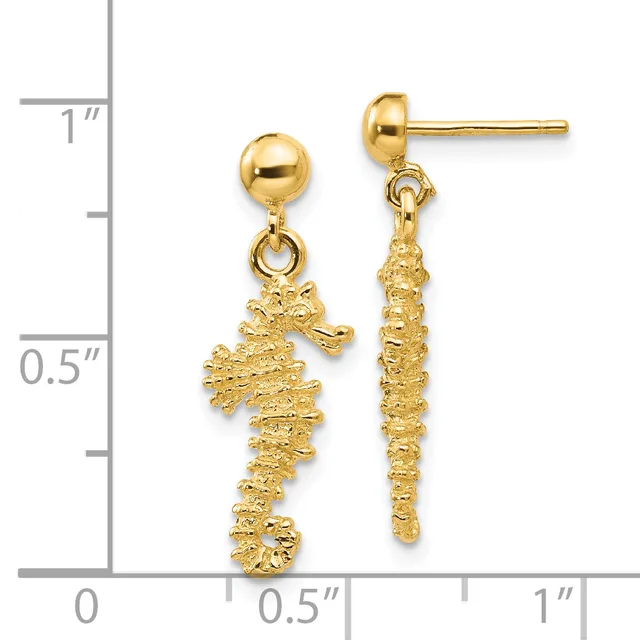 Pair of gold seahorse dangle earrings with textured finishes, shown next to a ruler measuring approximately one inch in length.