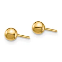 A pair of polished gold ball stud earrings with post backs displayed against a white background.