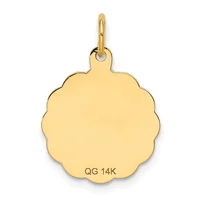 A scalloped flower-shaped gold pendant with a polished finish and a small stamped hallmark on the surface, suspended from a matching gold bail.