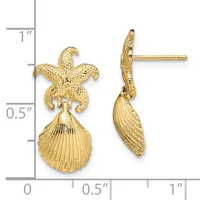 Gold starfish and shell drop earrings with textured finishes, shown next to a ruler indicating approximately one inch in length.