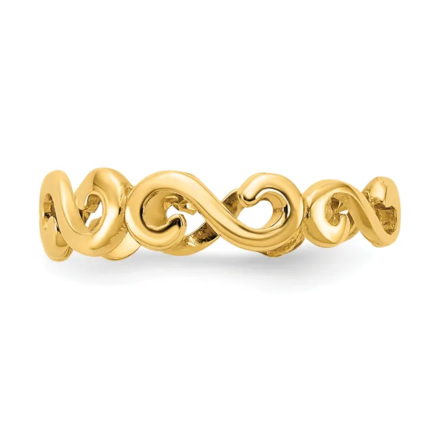 A polished gold ring featuring a continuous wavy, scrolling pattern across the band, shown against a white background.