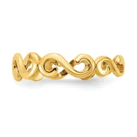A polished gold ring featuring a continuous wavy, scrolling pattern across the band, shown against a white background.