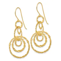 Pair of gold-colored dangle earrings with textured concentric circular loops suspended from curved ear wires.
