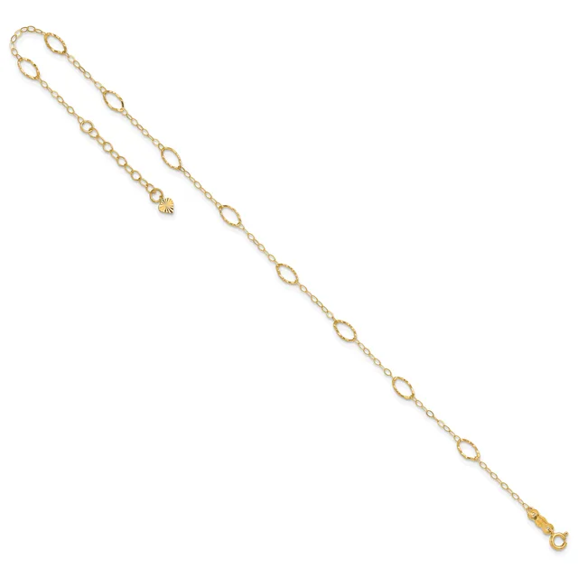 A gold-toned chain bracelet with alternating oval and small circular links, displayed diagonally against a white background.