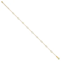 A delicate gold-toned chain bracelet with alternating oval and circular link details, displayed diagonally against a white background.