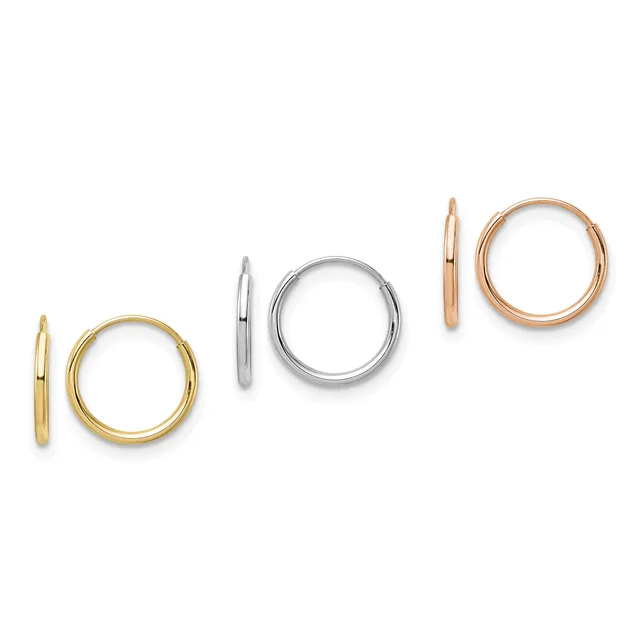 Three pairs of polished hoop earrings displayed in a row: yellow gold, white gold, and rose gold finishes.