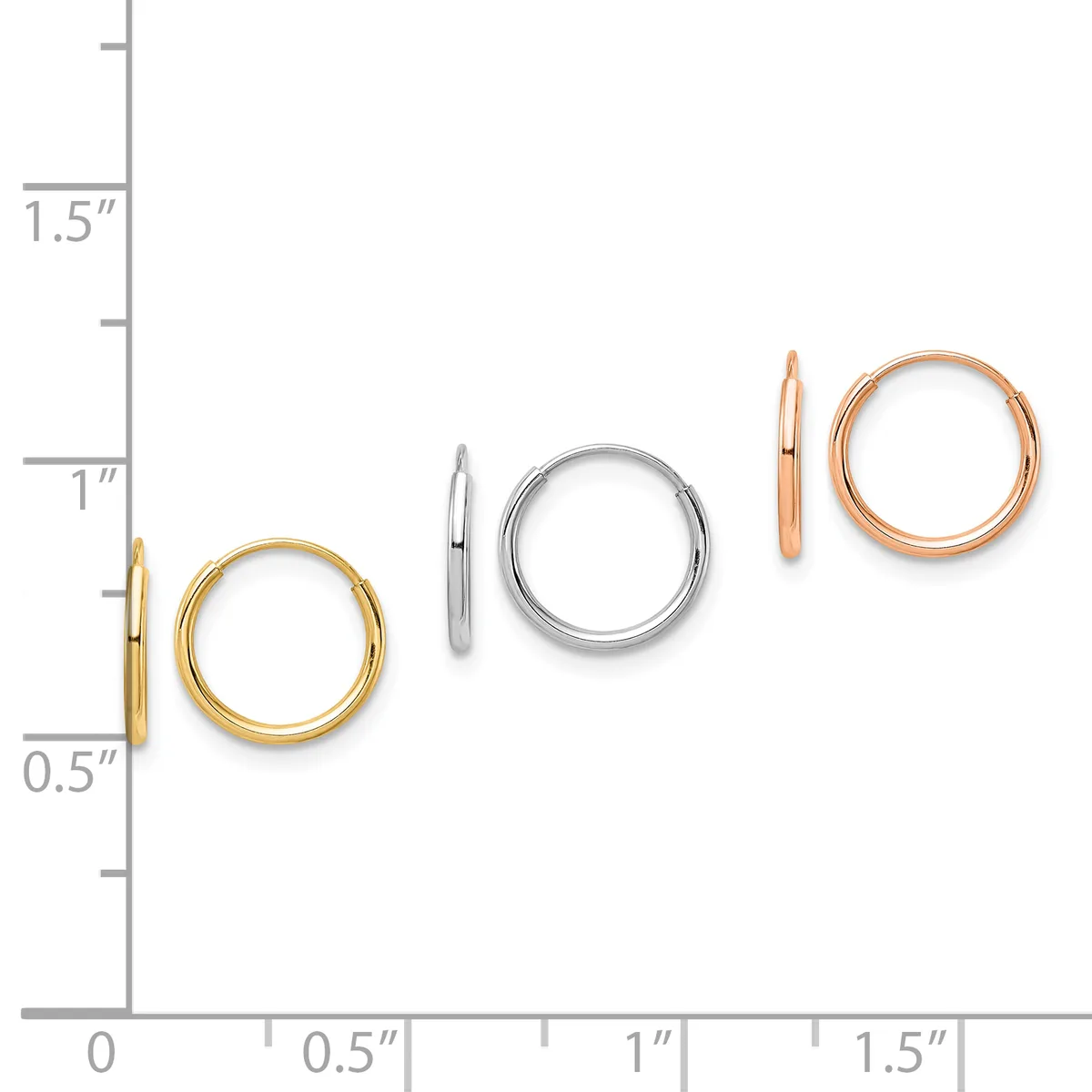 Three pairs of polished metal hoop earrings in gold, silver, and rose gold displayed next to a measurement ruler showing sizes from approximately 0.5 to 1.5 inches in diameter.