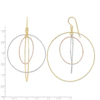 Two multi-loop wire earrings with concentric circles in mixed metals including gold, rose gold, and silver, shown with a measurement scale.
