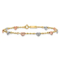 Gold bracelet with alternating heart charms in rose gold, white gold, and yellow gold finishes, displayed against a white background.