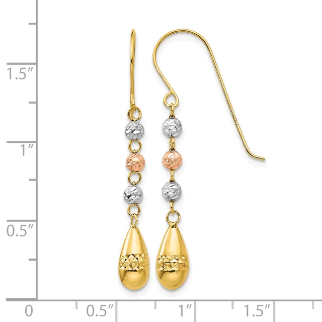 Pair of gold dangle earrings with textured beads in silver and rose gold tones, teardrop-shaped gold pendants, and gold shepherd's hook ear wires, displayed next to a ruler showing approximately 1.5 inches in length.