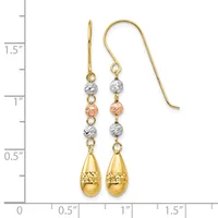 Pair of gold dangle earrings with textured beads in silver and rose gold tones, teardrop-shaped gold pendants, and gold shepherd's hook ear wires, displayed next to a ruler showing approximately 1.5 inches in length.