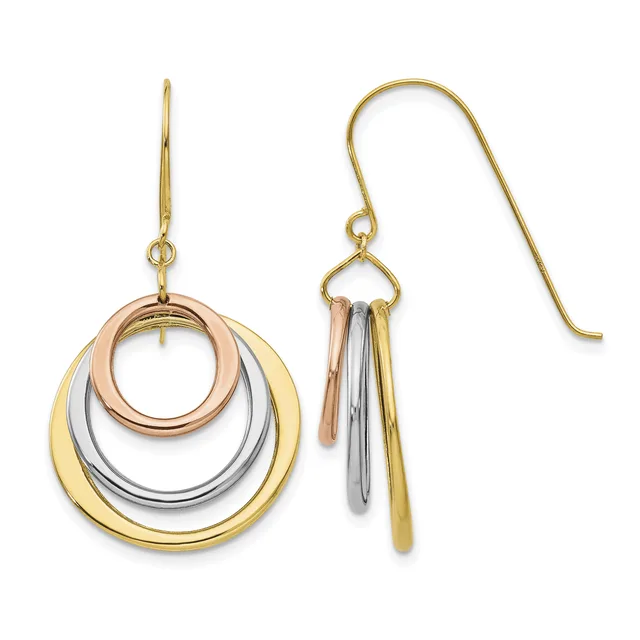 A pair of tri-color gold drop earrings with concentric circular rings in yellow, white, and rose gold, featuring matching fish hook wires.