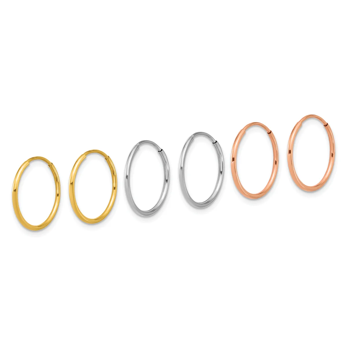 Six oval hoop earrings arranged in a row, progressing from smaller yellow gold pairs on the left to larger silver pairs in the middle to larger rose gold pairs on the right.
