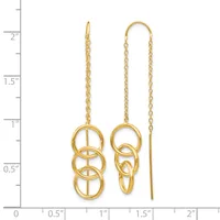 Pair of gold-colored threader earrings with interlocking circular rings at the bottom and delicate chain strands, displayed against a ruler showing approximately two inches in length.