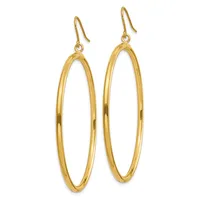 A pair of gold oval hoop earrings with hook-style ear wires, displayed against a white background.