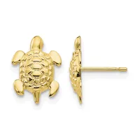 Pair of gold-colored turtle stud earrings shown from front and side views, with detailed shell texturing and post backs.