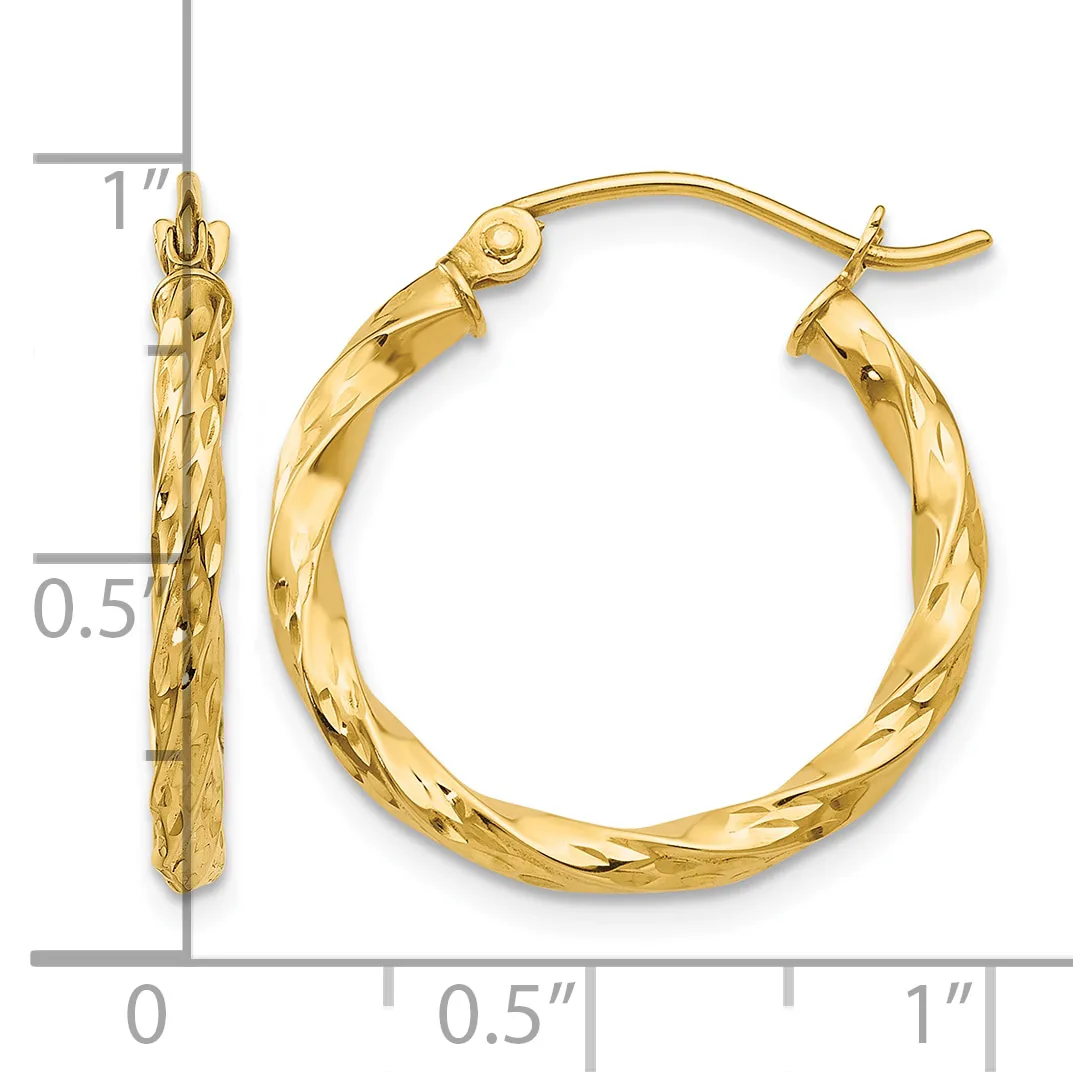 Gold twisted hoop earrings with leverback closures shown next to a ruler indicating approximately one inch in length.
