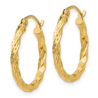 Pair of gold hoop earrings with a textured diamond-cut surface and hinged closures, displayed against a white background.