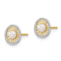 Pair of two-tone stud earrings featuring white pearls surrounded by radiating gold petals within oval frames, with gold posts.