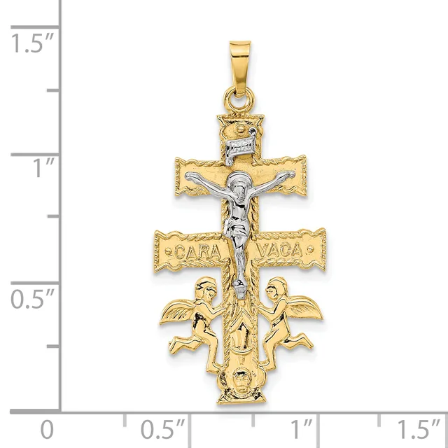 Two-tone gold crucifix pendant with white gold corpus, featuring angels at the base and decorative scrollwork, shown next to a measurement scale.