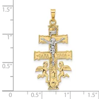 Two-tone gold crucifix pendant with white gold corpus, featuring angels at the base and decorative scrollwork, shown next to a measurement scale.