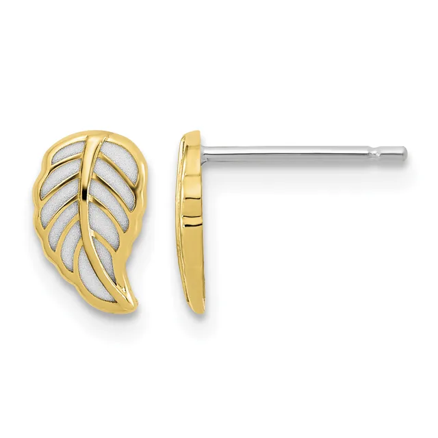 A pair of gold leaf-shaped stud earrings with white enamel fill and textured veining detail, shown from front and side views on silver posts.