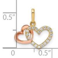 Two interlocking heart pendants in yellow and rose gold with diamond accents, shown next to a ruler indicating 0.5 inch height and width.
