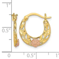 Two gold hoop earrings with textured leaf-like patterns and rose gold-colored round accents, shown next to a measurement scale.