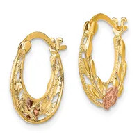 Pair of gold hoop earrings with textured surfaces and rose gold heart charms, shown against a white background.