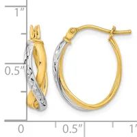A pair of two-tone gold hoop earrings with a twisted diamond-cut texture, measuring approximately one inch in length, shown with a measurement scale.