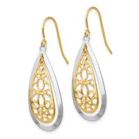 A pair of teardrop-shaped earrings with gold filigree designs inside silver outer frames, suspended from gold shepherd's hook wires.